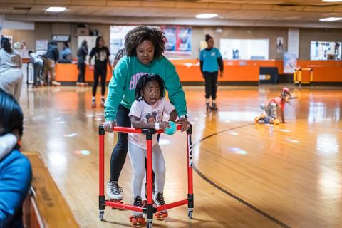 Mom and child roller skating