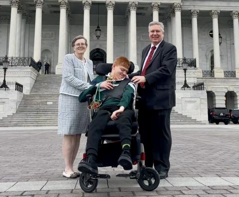 The Dunham family pose in front of the U.S. Capitol.