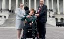 The Dunham family pose in front of the U.S. Capitol.